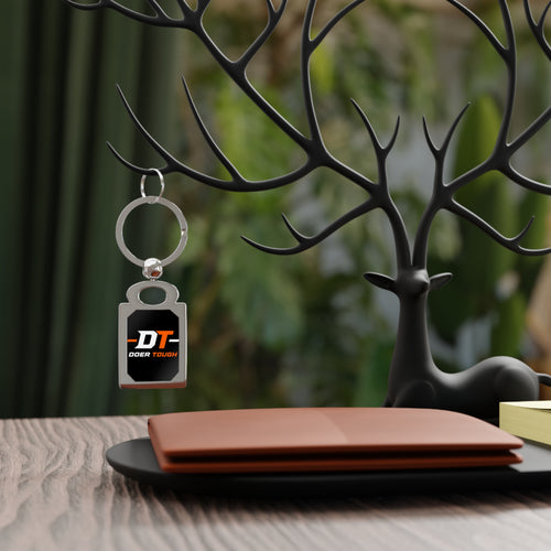 Doer Tough keychain in hand — solid zinc alloy work keyring